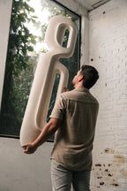 Escultura de parede Passante